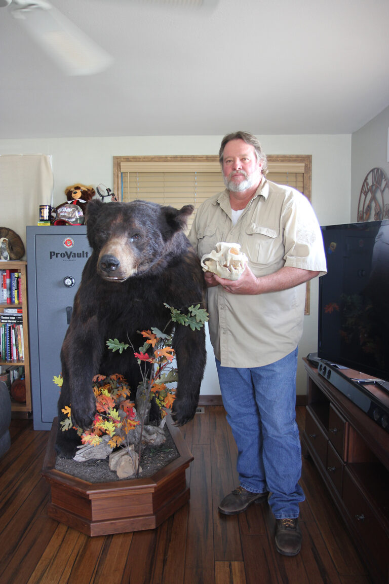 Bear-Denning_Man-with-Stuffed-Bear